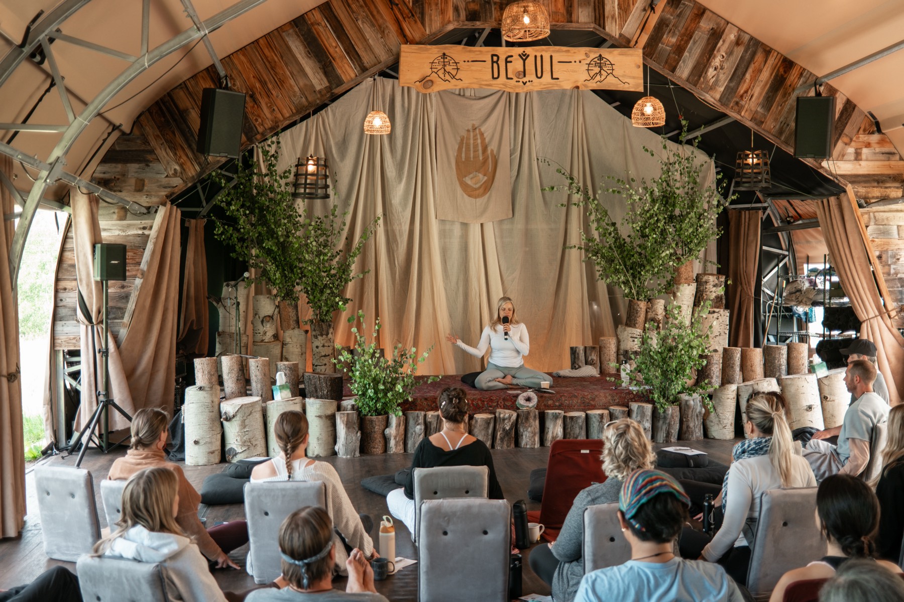 A guided session in the Gathering Tent at Beyul